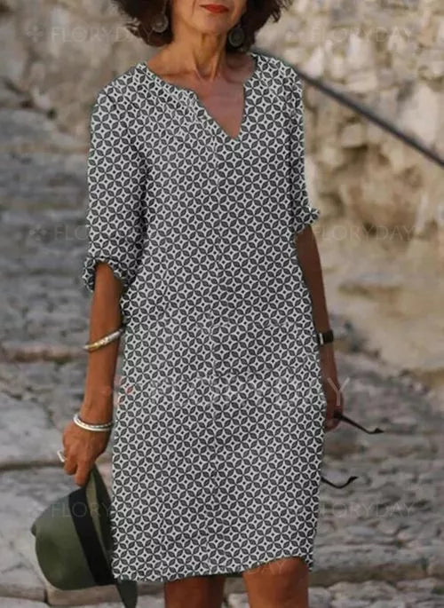 Image of Cassandra | Women's V-Neck Midi Dress