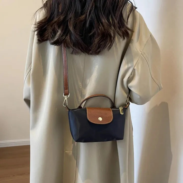 Small shoulder bag with strap