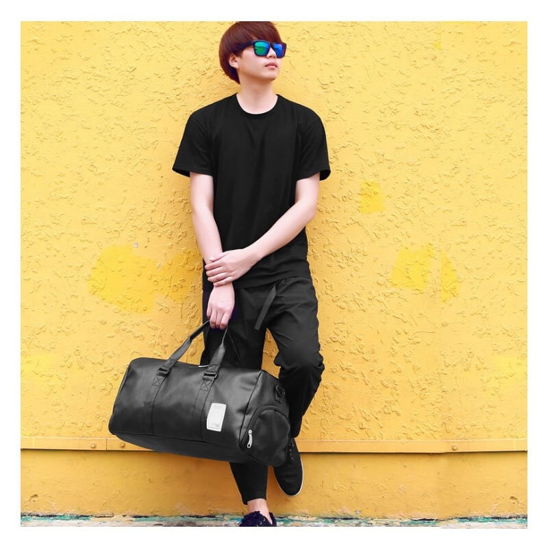 Water-Resistant Leather Travel and Gym Duffel Bag with Shoulder Strap for Sports and Storage
